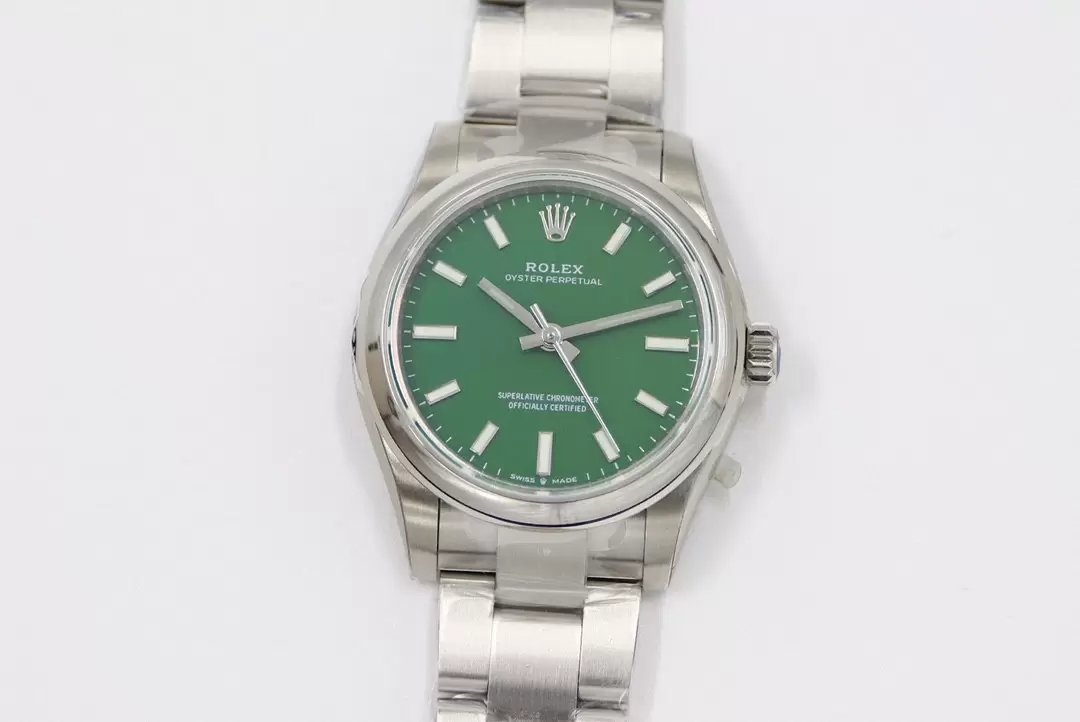 Swiss Rolex Oyster Perpetual Green Dial Stainless Steel Case And Bracelet